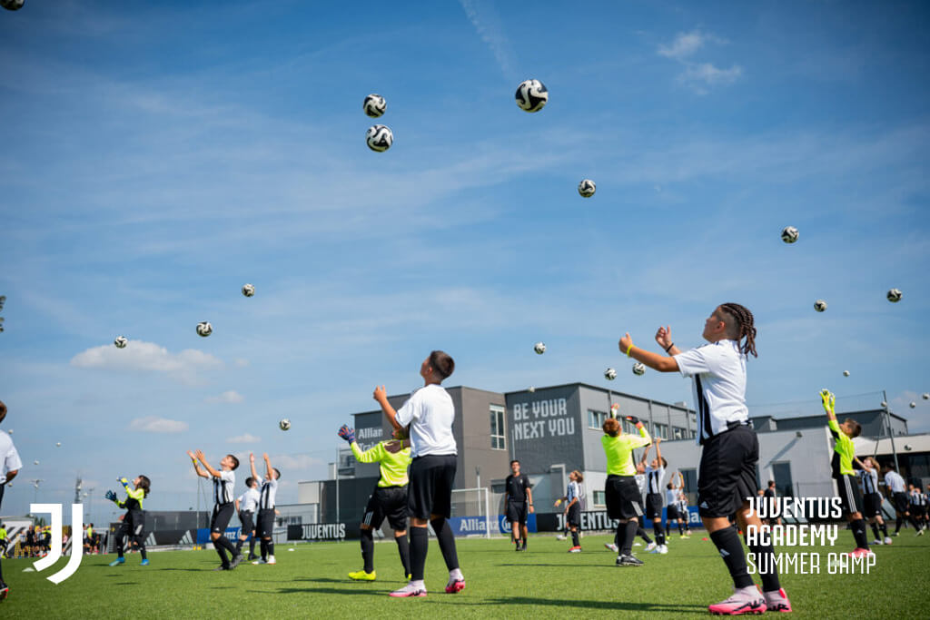 Youth soccer players training at the Official Juventus Training Center in Vinovo, Turin during the 2026 Juventus Summer Soccer Camps.